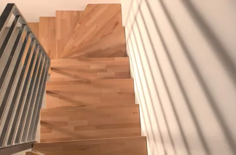 Scala con montante centrale autoportante in acciaio verniciato con gradini in faggio lamellare